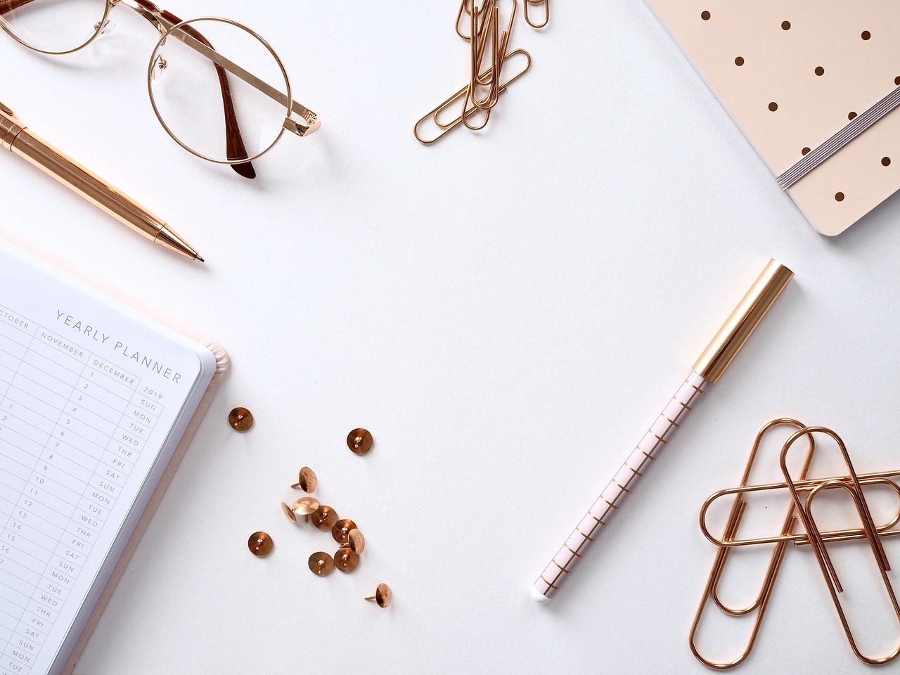 Notebook, desk, paper — Beyond the Mailbox: Nonprofit Direct Mail Fundraising Tracking Strategies