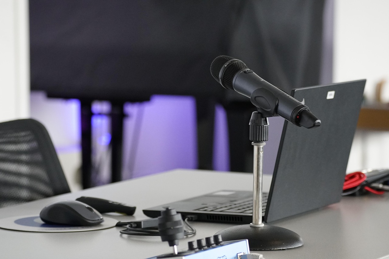 Laptop, conference table, mouse — DIY or Professional Asbestos Test Options Available